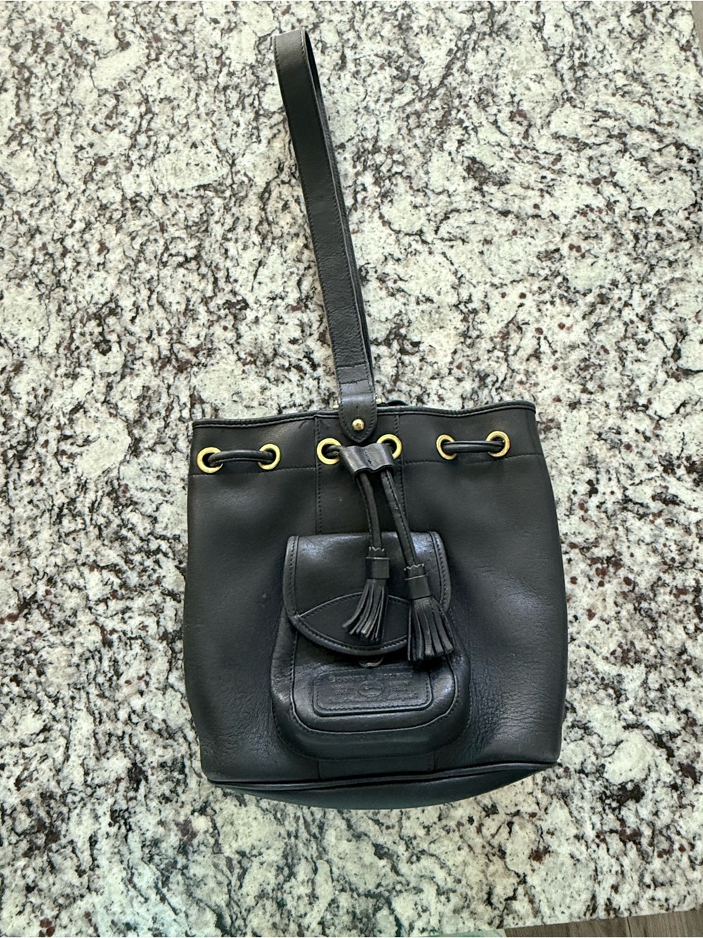 Vintage Dooney and Bourke Black Leather Drawstring Sling Bag with Tassels